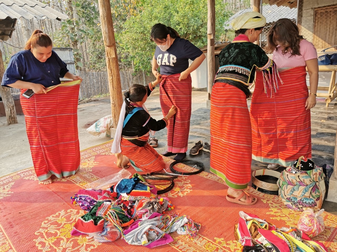 Tourists dress in ethnic clothing before they start the tour of a village in Chiang Mai, Thailand, on February 28, 2020. Photo courtesy of Wocation.