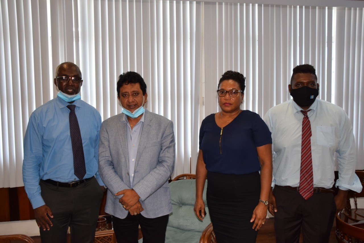 Attorney General, Anil Nandlall and officials of the Financial Intelligence Unit