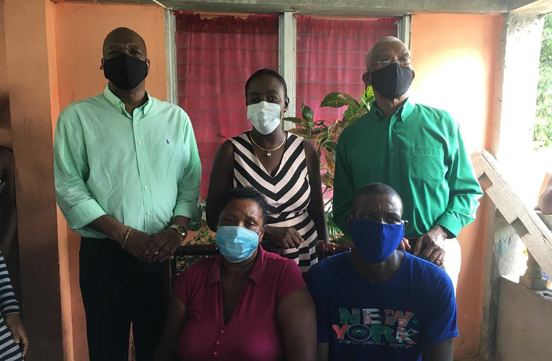 Former President David Granger and Opposition Leader Joseph Harmon met with the parents of Joel Henry and his cousin, Isaiah Henry who were murdered at  Cotton Tree Village West Coast Berbice