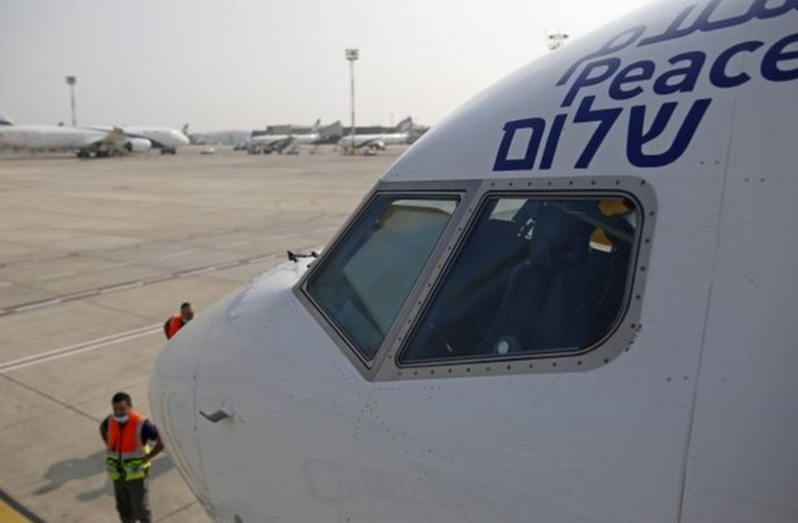 The El Al plane was decorated with the word for "peace" in Arabic, English and Hebrew