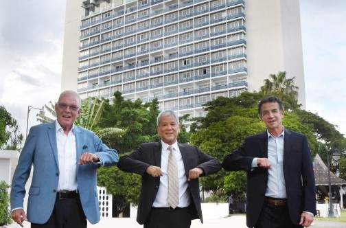 Jamaica Pegasus hotel owner/operator Kevin Hendrickson (centre) shares an elbow bump with the hotel's former General Manager Peter Hilary (left) and his successor Zaven Yaralian at a welcome reception for Yaralian held in the gardens of the hotel on August 11, 2020. (Photo: Naphtali Junior)