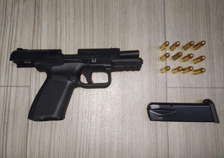 The 9MM firearm and 12 live 9MM ammunition found by police
