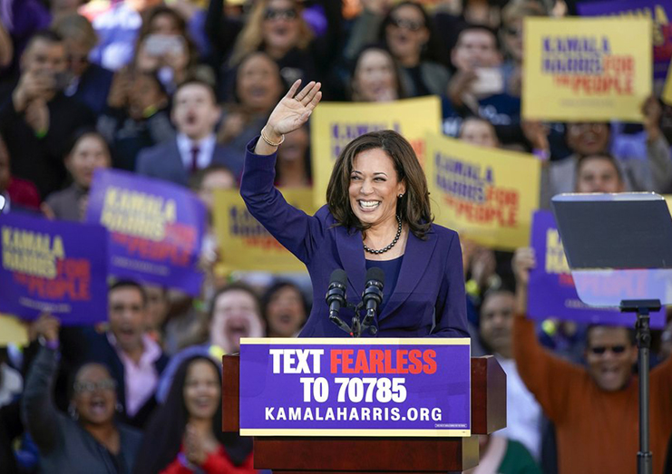 FILE - In this Jan. 27, 2019, file photo, Democratic Sen. Kamala Harris, of California, waves to the crowd as she formally launches her presidential campaign at a rally in her hometown of Oakland, Calif. Harris made history Saturday, Nov. 7, as the first Black woman elected as vice president of the United States, shattering barriers that have kept men — almost all of them white — entrenched at the highest levels of American politics for more than two centuries. (AP Photo/Tony Avelar, File)