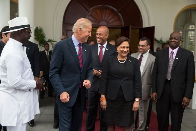 Vice-President Joe Biden walks with then-Prime MInister Kamla Persad-Bissessar and President Michel Martelly of Haiti, after meeting at the Diplomatic Centre in Port-of-Spain on May 28, 2013.

Official White House Photo by David Lienemann