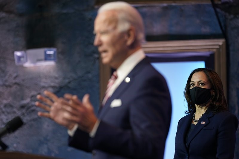 President-elect Joe Biden, accompanied by Vice President-elect Kamala Harris, speaks about economic recovery at The Queen theater, Monday, Nov. 16, 2020, in Wilmington, Del. (AP Photo/Andrew Harnik)