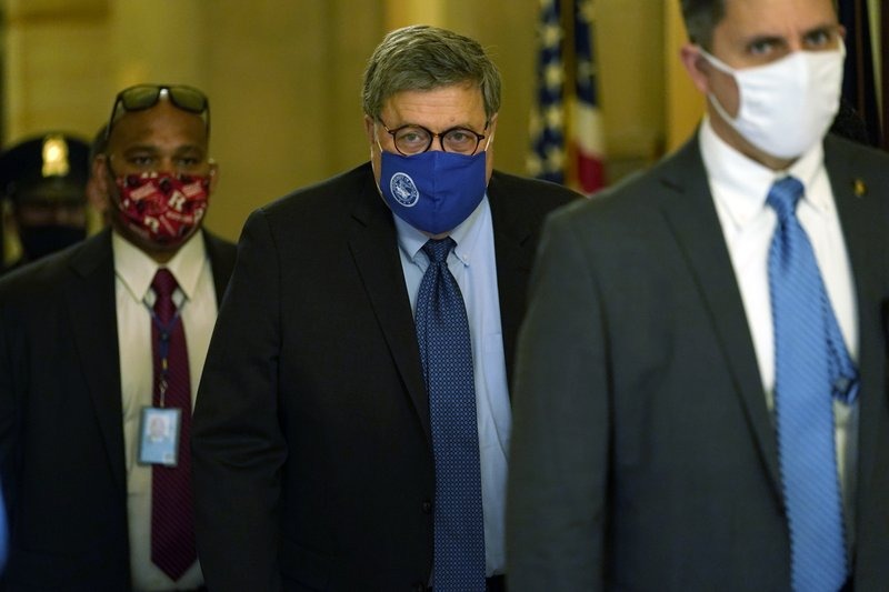 Attorney General William Barr leaves the office of Senate Majority Leader Mitch McConnell of Ky., on Capitol Hill in Washington, Monday, Nov. 9, 2020. (AP Photo/Susan Walsh)