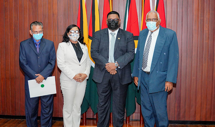 President Irfaan Ali (second right) with newly appointed members of the Public Service Appellate Tribunal (OP photo)
