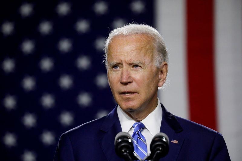 FILE PHOTO: Democratic U.S. presidential candidate and former Vice President Joe Biden arrives to speak about modernizing infrastructure and his plans for tackling climate change during a campaign event in Wilmington, Delaware, U.S., July 14, 2020. REUTERS/Leah Millis/File Photo