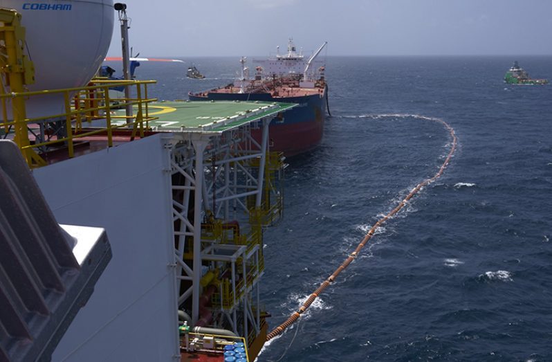 Flashback: The fuel hose leads from the Liza Destiny to the Cap Philippe for the transfer of Guyana’s first million barrels of crude (MoTP photo)