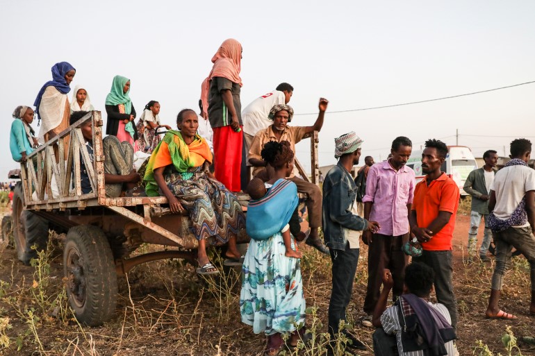 Ethiopian refugees gather in Qadarif region, easter Sudan. [Marwan Ali/AP Photo]