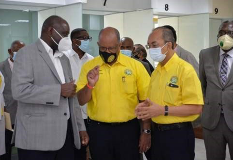 From left, Permanent Secretary in the Ministry of National Security, Courtney Williams, Chief Executive Officer at the Passport Immigration and Citizenship Agency (PICA), Andrew Wynter and Minister of National Security, Dr Horace Chang, in discussion following the opening of PICA's regional office in Montego Bay Friday.