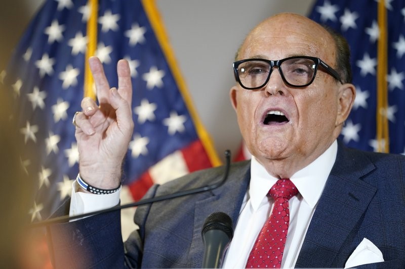 FILE - Former Mayor of New York Rudy Giuliani, a lawyer for President Donald Trump, speaks during a news conference at the Republican National Committee headquarters, Thursday Nov. 19, 2020, in Washington. (AP Photo/Jacquelyn Martin, file)