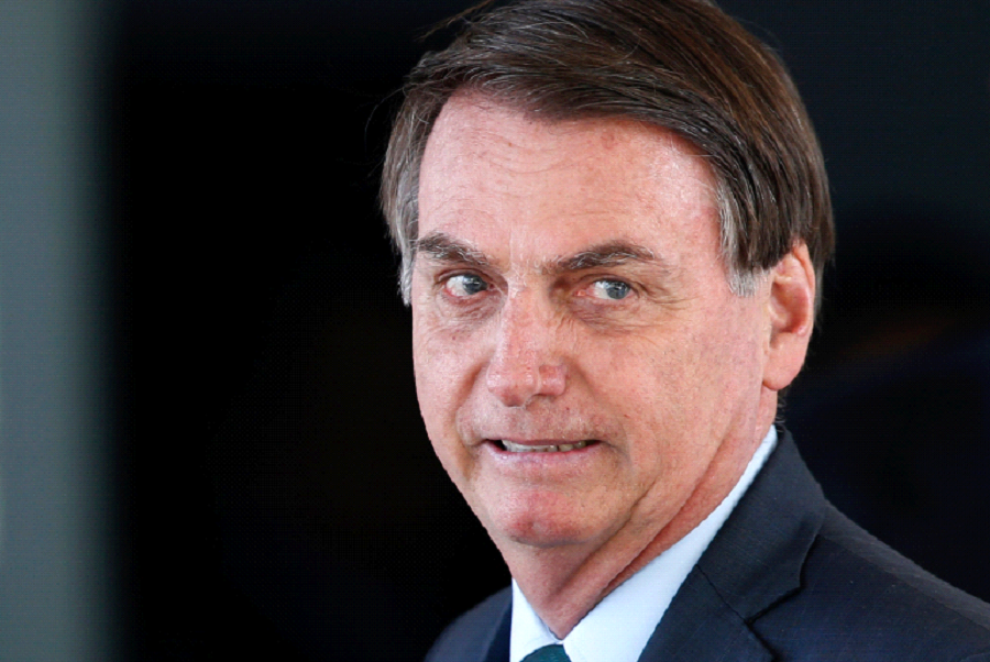 'Prices soared after the Health Ministry expressed an interest in buying syringes," Bolsonaro wrote on social media [File: Eraldo Peres/AP]