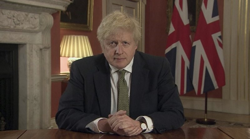 In this image taken from video, Britain's Prime Minister Boris Johnson makes a televised address to the nation from 10 Downing Street, London, Monday Jan. 4, 2021, setting out new emergency measures to control the spread of coronavirus in England. (Pool via AP)