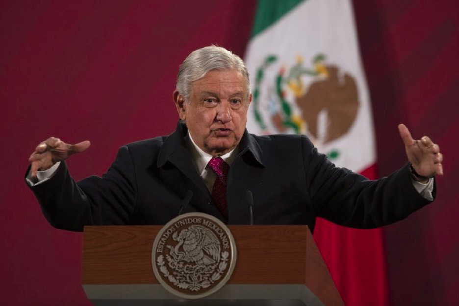 Lopez Obrador gives his daily, morning news conference at the presidential palace, Palacio Nacional, in Mexico City. Mexico President Andrés Manuel López Obrador says he has tested positive for COVID-19 and is under medical treatment, Sunday, Jan. 24, 2021. (AP Photo/Marco Ugarte, File)