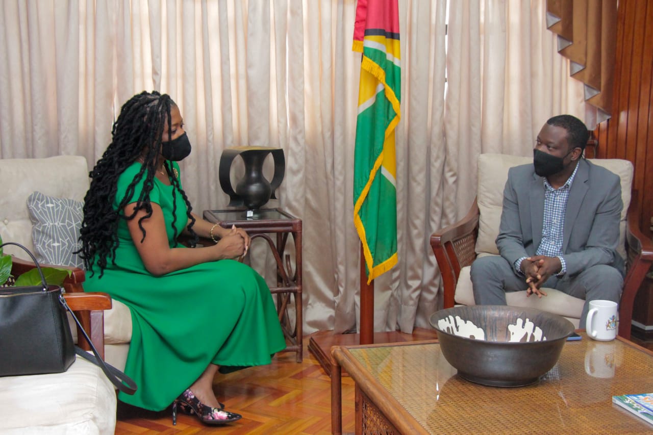 Minister Todd engages in a discussion with Opposition MP, Ms. Amanza Walton- Desir on the recent abduction of Guyanese fishermen