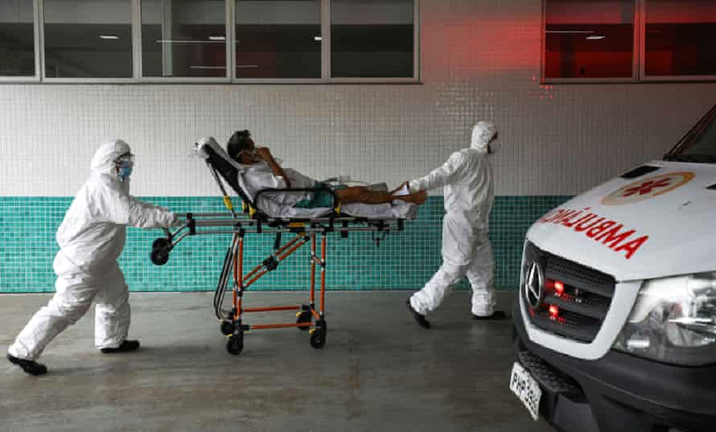 A Covid patient is taken to hospital in Manaus. More than 206,000 people have now died across Brazil, the second highest total in the world after the US. Photograph: Bruno Kelly/Reuters