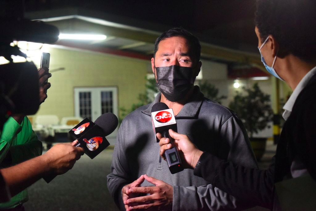 National Security Minister Stuart Young is interviewed by members of the media after visiting Prime Minister Dr Keith Rowley at the West Shore Private Hospital, last night. (KERWIN PIERRE)