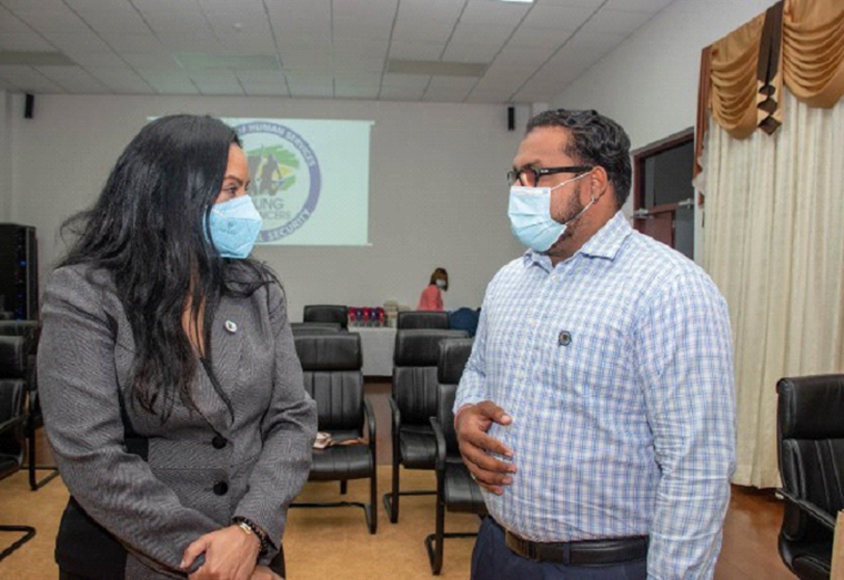 Minister of Human Services and Social Security Dr. Vindhya Persaud engaging one of the youths