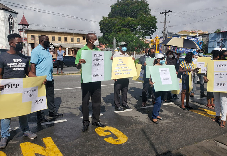 APNU+AFC Members of Parliament and supporters picketing the Guyana Police Force outside of the Georgetown Magistrates’ Court