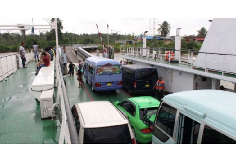 Vehicles being loaded on to the MV Canawaima  while it was in operation
