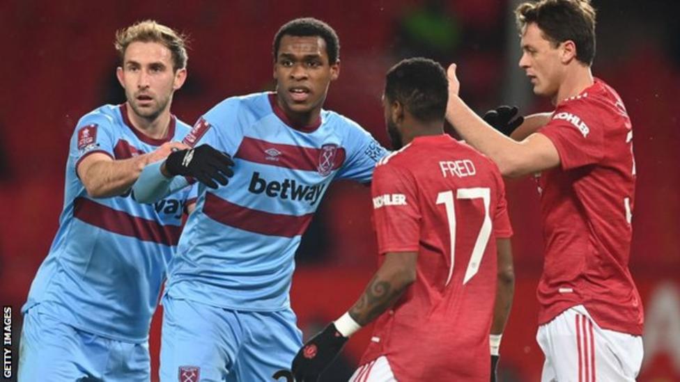 Issa Diop (middle left) didn't return from the dressing room for the second half of the game