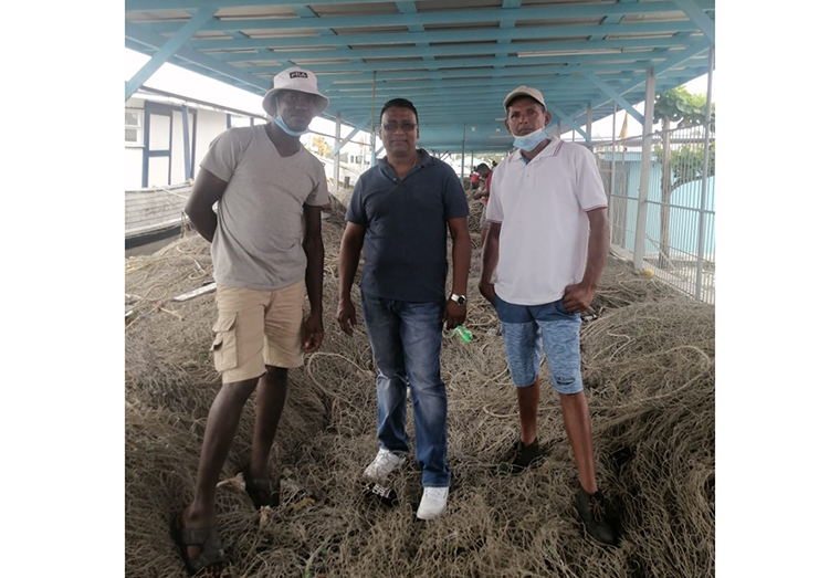 Owner of the vessel – Lady Nayera – Kumar Lalbachan, standing alone side Toney Garraway and Richard Ramnarine both of whom captained the vessels.