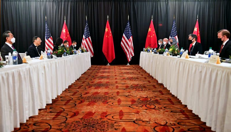 US and Chinese officials at their summit