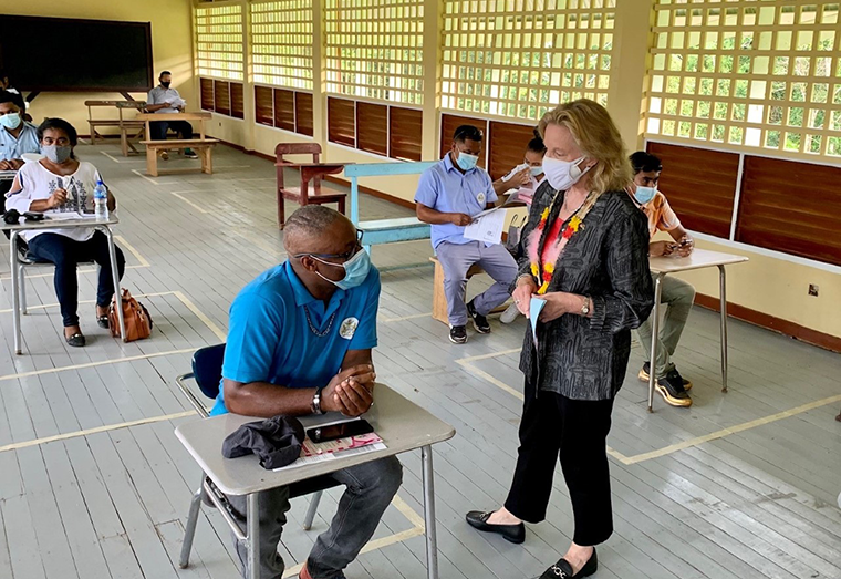 US Ambassador to Guyana Sarah Lynch engages with a participant of the medical outreach training