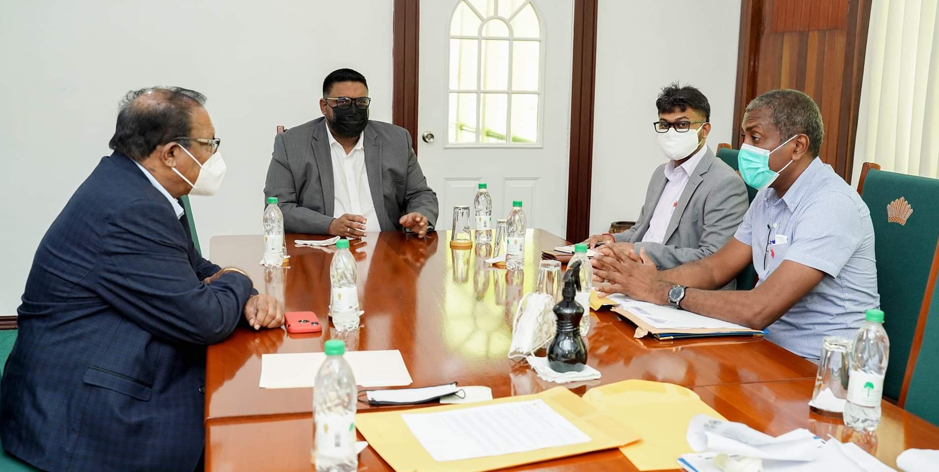President Irfaan Ali (center) meets with Mayor of Georgetown, Ubraj Narine and Deputy Mayor, Alfred Mentore back in March 2021.