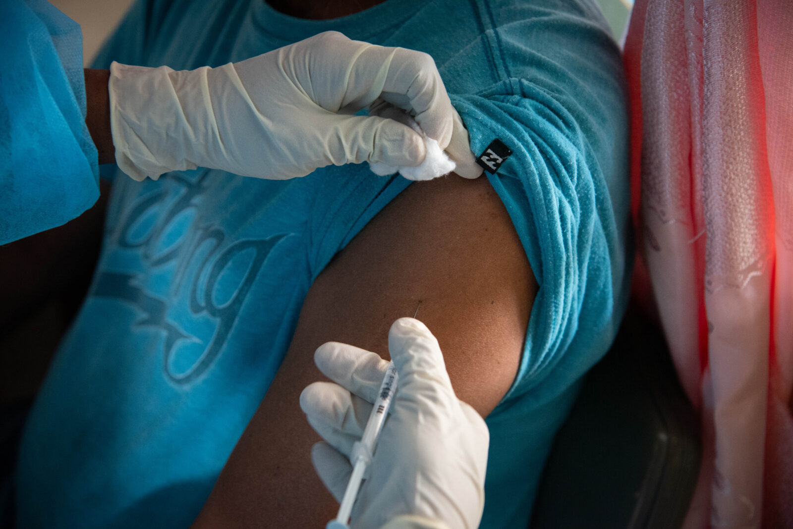 The COVID-19 vaccine being administered (DPI photo)