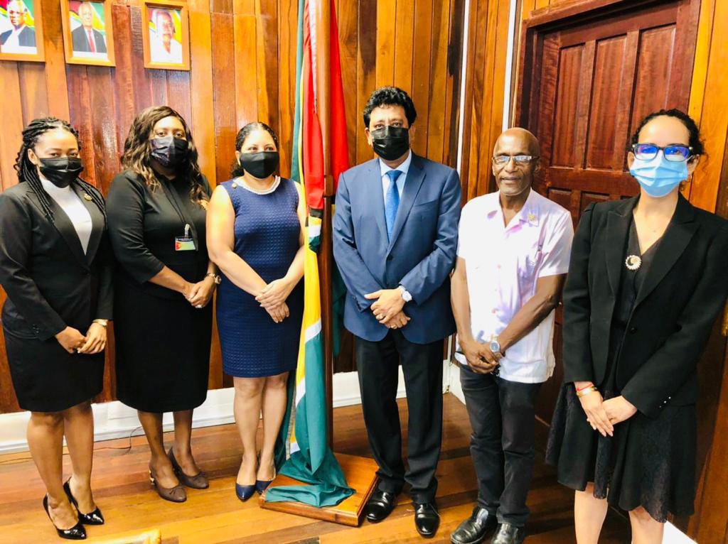 Attorney General and Minister of Legal Affairs, Anil Nandlall flanked by representatives from the University of Guyana. Vice Chancellor of the University of Guyana, Professor Dr. Paloma Mohamed Martin; Registrar of the University of Guyana, Dr. Nigel Gravesande;
 and the Head of the Department of Law of the University of Guyana, Kim Kyte-Thomas
