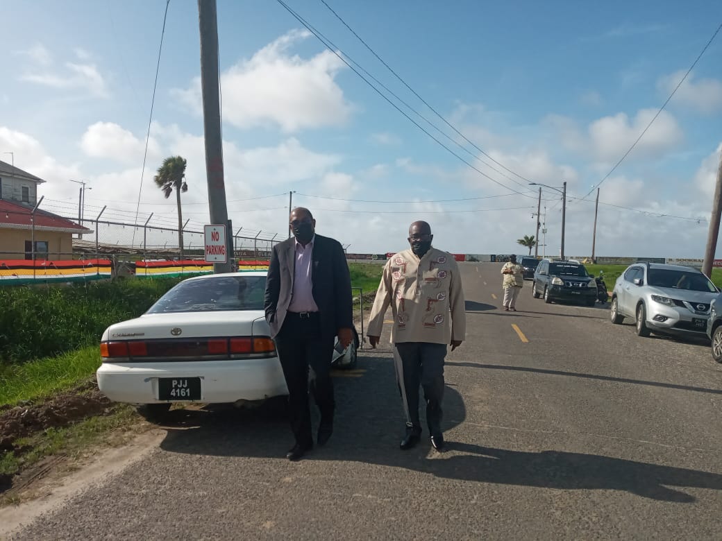 Accompanied by his lawyer Nigel Hughes, Guyana’s Chief Elections Officer (CEO), Keith Lowenfield makes his way to the CID Headquarters at Eve Leary Tuesday afternoon 
