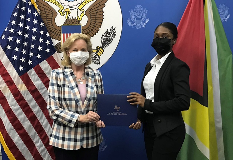 Emmanuela Desir (r) and US Ambassador to Guyana, Sarah Lynch