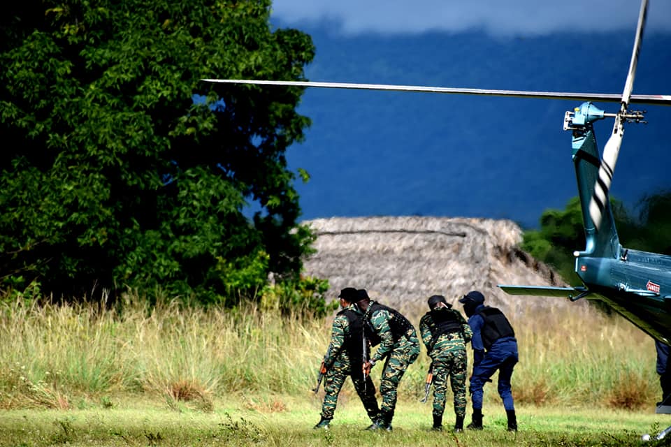 GDF and police ranks on the ground in the Rupununi where an operation is being carried out to determine whether a plane may have crashed into the Kanuku mountains. (Kev Thomas photo)