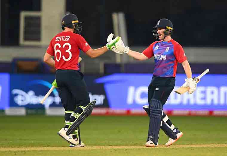 Jos Buttler and Eoin celebrate victory for England (getty Images)