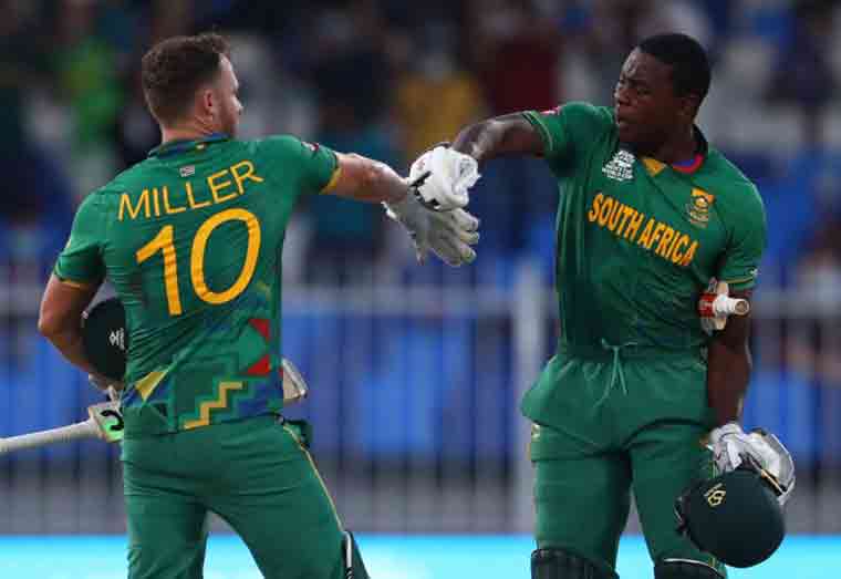 David Miller and Kagiso Rabada celebrate after pulling off the tricky win  ICC via Getty