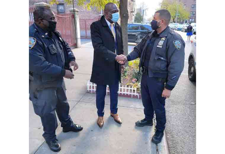 Rickford Burke posted photographs on his Facebook page of him greeting New York City Police on Saturday