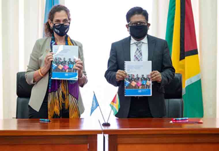 (L-R) United Nations Resident Coordinator in Guyana, Yesim Oruc and Senior Minister in the Office of the President with responsibility for Finance, Dr. Ashni Singh following the signing of the multi-country Sustainable Development Cooperation Framework (MSDCF) 2022-2026 agreement