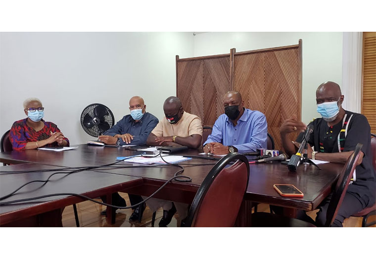Chairman of the PNCR, Volda Lawrence (extreme left) and PNCR Chief Elections Officer Vincent Alexander (extreme right). In the centre from left-right are: Dr. Richard Van West-Charles, Aubrey Norton and Joseph Harmon all of whom are vying for the Leader of the PNCR. 