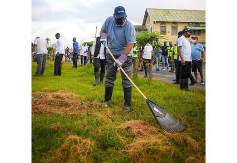 President Irfaan Ali leading from the front during Saturday's cleanup exercise