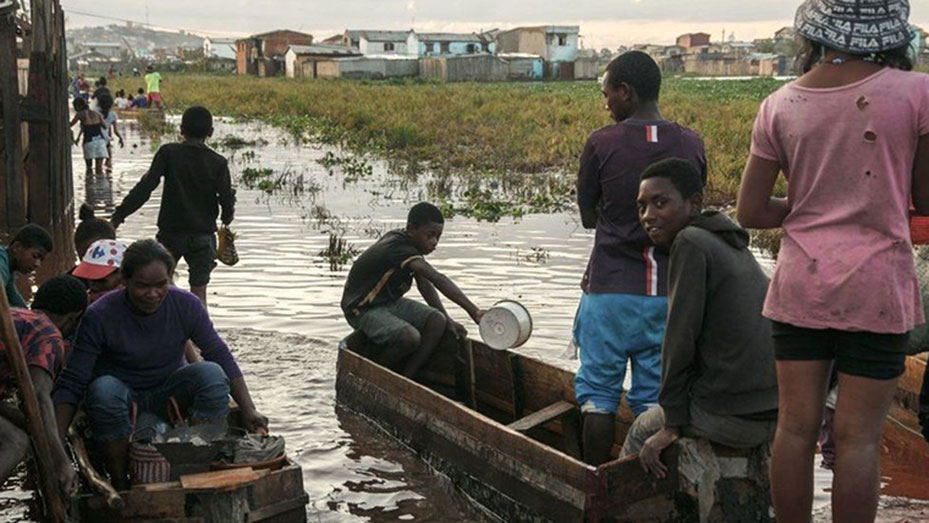In one neighbourhood of Madagascar's capital, Antananarivo, people are having to use canoes to reach their flooded homes