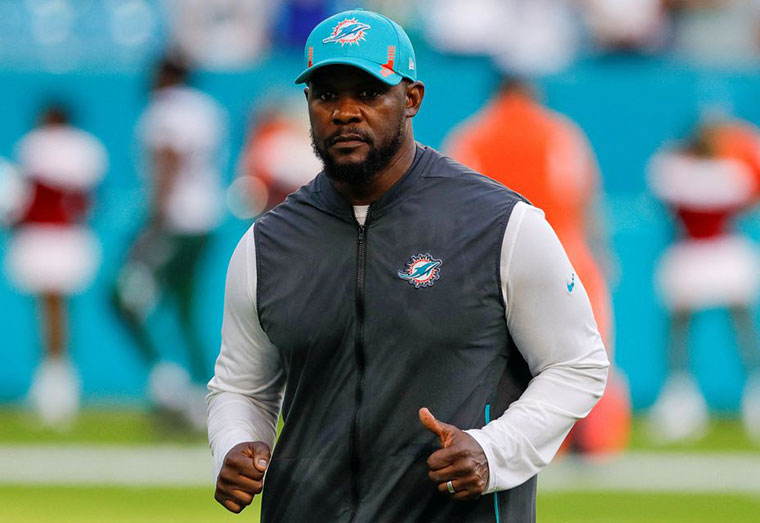 Miami Dolphins head coach Brian Flores runs off the field after winning the game against the New York Jets at Hard Rock Stadium. Mandatory Credit: Sam Navarro-USA TODAY Sports/File Photo