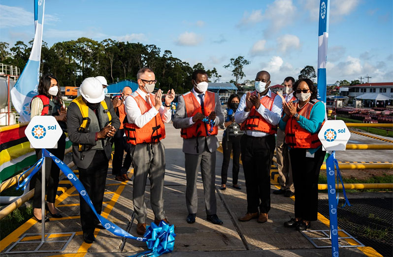 Minister of Foreign Affairs, Hugh Todd, Sol Guyana General Manager, Earl Carribon and President of Parkland International, Pierre Magnan commission the jetty in the presence of other officials