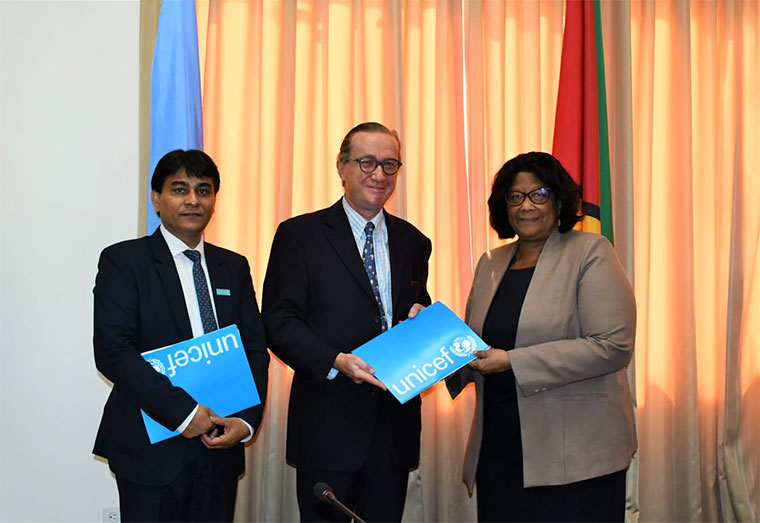 UNICEF Representative to Guyana and Suriname Nicolas Pron, along with Deputy Representative Irfan Akhtar, presents UNICEF’s Country Programme Document 2022-2026 to Permanent Secretary of Guyana’s Ministry of Foreign Affairs, Ambassador Elisabeth Harper in Georgetown, Guyana on Tuesday, 1 March 2022. 