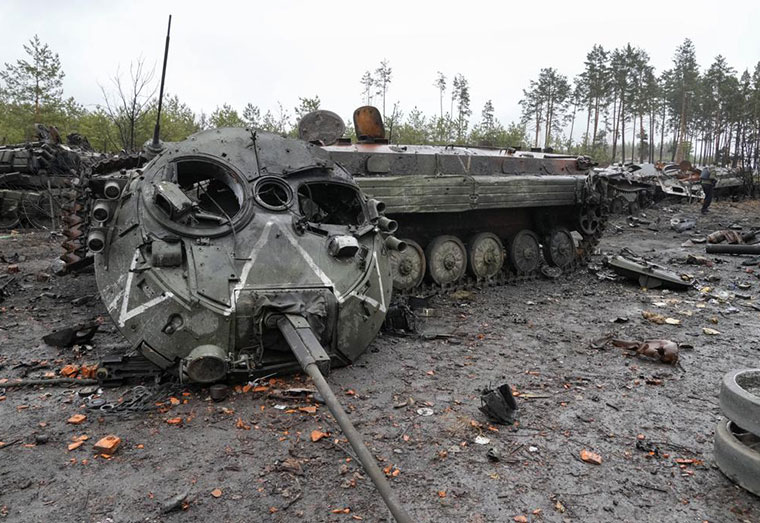 The letter V, the Russian forces emblem, is seen on a blown Russian tank turret in the village of Dmytrivka close to Kyiv, Ukraine, Saturday, Apr. 2, 2022. At least ten Russian tanks were destroyed in the fighting two days ago in Dmytrivka. At least ten Russian tanks were destroyed in the fighting two days ago in Dmytrivka. (AP Photo/Efrem Lukatsky)