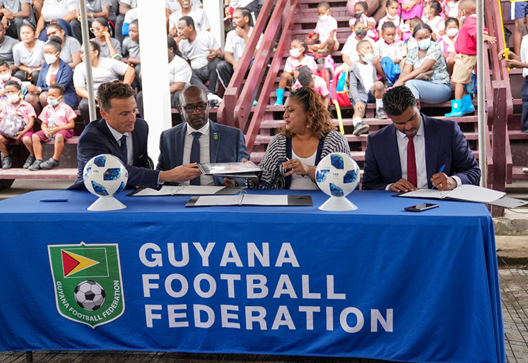 Minister of Education, Priya Manickchand, Minister of Culture, Youth and Sport, Charles Ramson Jr, F4S Project Leader, Mr Alexandre Gros and GFF President Wayne Ford sign the MOU