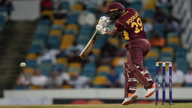 West Indies' captain Nicholas Pooran plays a shot against New Zealand during the first ODI at Kensington Oval in Bridgetown, Barbados, Wednesday, Aug. 17, 2022. (AP Photo/Ramon Espinosa).