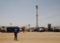 A worker walks at a Tullow Oil explorational drilling site in Lokichar, Turkana County, Kenya,