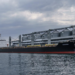 The ship Navi-Star sits full of grain since Russia's invasion of Ukraine began five months ago as it waits to sail from the Odesa Sea Port, in Odesa, Ukraine